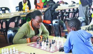 • IREEN Shanduka of Luangwa (left) ponders a move against Sarah Zulu of Rufunsa during the Zambia Closed Chess tournament at the Olympic Youth Development Centre. Picture by SHAMAOMA MUSONDA
