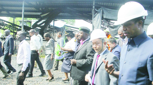 • PRESIDENT Edgar Lungu (right), accompanied by Collum Coal Mining Shaft Six Limited managing director Xu Jian Lin (second from right), inspects the mine in Sinazongwe yesterday. Picture by SALIM HENRY/STATE HOUSE
