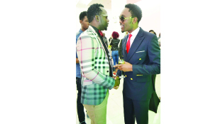 • BLACK Muntu member, who is also Zambia Association of Musicians spokesperson Mwembe Chulu (left) with fellow artiste CQ ‘Mzukulu’ during the Mosi Lager Zambian Music Awards after party in Lusaka on Saturday evening. Picture by CHUSA SICHONE.