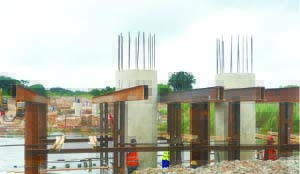 •WORKS on the Mufuchani Bridge across the crocodile-infested Kafue River in Kitwe have commenced. Above, some of the pillars that will support the bridge have already been erected. Picture by MOFFAT CHAZINGWA
