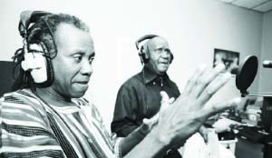 • VETERAN musician Rikki Ililonga with former president Kaunda in the studio.