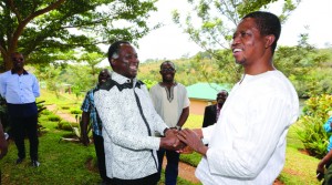 •PRESIDENT Edgar Lungu (right) greets former United Party for National Development vice president Richard Kapita who joined the Patriotic Front at a rally addressed by the President in Mwinilunga yesterday.Picture by EDDIE MWANALEZA.