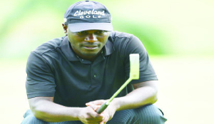 •ZAMBIA’S Madalitso Muthiya lines up a putt during just-ended 2015 AfrAsia Bank Mauritius Open Championship at Heritage Golf Club in Bel Ombre, Mauritius. Picture by GETTY IMAGES EUROPE
