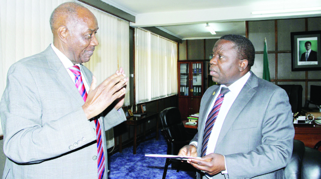 • VETERAN politician Vernon Johnson Mwaanga stressing a point when he paid a courtesy call on Foreign Affairs Minister Harry Kalaba at his office yesterday.