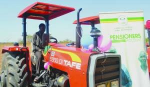 •CHIZIKA Katongo of Nkeyema District of Western Province, test-drives one of the tractors handed over by the Zambia National Farmers Union (ZNFU), under the Bunjimi Asset Plus a loan facility by the National Savings and Credit Bank (NATSAVE).Picture by KENNEDY MUPESENI.