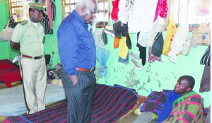 •Home Affairs Deputy Minister Panji Kaunda talks to an inmate at Livingstone Central Prison during a tour of the facility on Monday this week. Picture by BRIAN HATYOKA