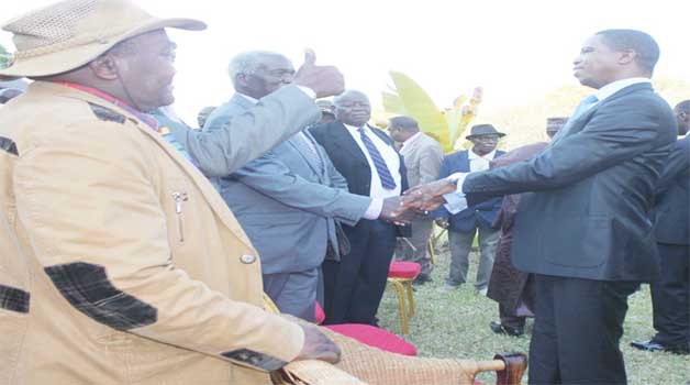 • PRESIDENT Edgar Lungu (right) shakes hands with Chief Hanjalika of Mazabuka District as Chief Nyawa of Kazungula District (left wearing hat) looks on. Picture by BRIAN HATYOKA.