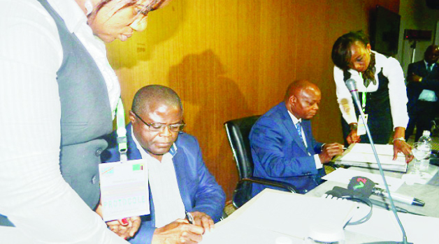 •MINES Energy and Water Development Minister Christopher Yaluma (left) with his Democratic Republic of Congo counterpart Jeannot Gamanda (right), signing documents for the Inter-Governmental Memorandum of Understanding (MoU) for the development of hydropower sites on Luapula River at a ceremony held in Kinshasa yesterday. Picture by MOFFAT CHAZINGWA.