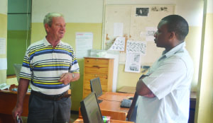•FORMER Times Printpak Zambia advertising manager Roy Bowton (left) talks to chief sub-editor (designate) Bennet Simbeye when he visited the Times offices in Ndola yesterday. Picture by MUNAMBEZA MUWANEI