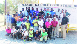 • FUTURE STARS....Junior golfers who are undergoing an intensive training programme conducted by South African experts pose for a group photo at Mazabuka Golf Club.