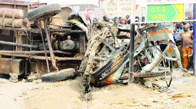• A MANGLED wreckage of the South African truck and the Toyota Hiace minibus involved in the accident on Mumbwa Road. Picture By SAM PHIRI