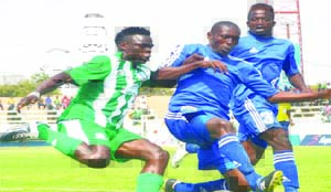 • MUFULIRA Wanderers’ Nicholas Kamocha (left) battle for the ball with Gilbert Tembo of Nkwazi during their 2015 Barclays Cup quarter-final match at Nkoloma Stadium in Lusaka yesterday. Nkwazi won 4-3 on post-match penalties. Picture by GWEN CHIPASULA