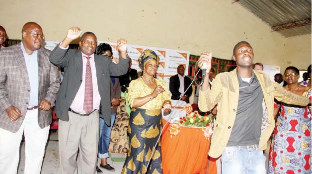 •FIRST Lady Esther Lungu (third from left) and Chief Chikanta could not resist the music by Southern Province-based musician One J during the witnessing of the partnership between Government, World Vision, Chief Chikanta and other partners in Kalomo District on Friday. Picture by THOMAS NSAMA