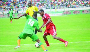 •SUDAN winger Babeka Bakri (right) is blocked by Chipolopolo defender Benedict Chepeshi during the Russia 2018 FIFA World Cup qualifiers second round, return leg match at Levy Mwanawasa Stadium on Sunday. Picture by GWEN CHIPASULA