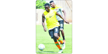 • CHIPOLOPOLO midfielder Isaac Chansa gets away from Nathan Sinkala during a training session at Independence Stadium in Lusaka yesterday. Picture by GWEN CHIPASULA