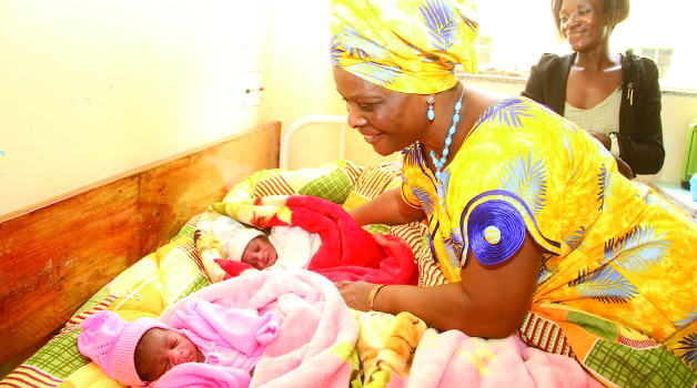 • FIRST Lady Esther Lungu admires twins during the presentation of gifts to Christmas babies and patients at the University Teaching Hospital yesterday. Picture by THOMAS NSAMA