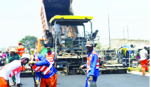 •AVIC International is currently expanding Mumbwa Road in Lusaka into a dual carriageway under the L400 Road Project. Above, workers from the Chinese firm on site. Picture by PASSY HAACHIZO.
