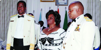 •PRESIDENT Edgar Lungu (left), First Lady Esther and ZAF Commander Eric Chimese during the ZAF annual ball at ZAF Chamba Valley Officers’ Mess on Friday evening. Picture By ROYD SIBAJENE/ZANIS