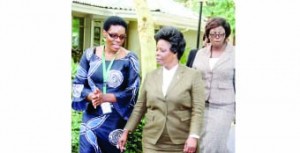 •First Lady Esther Lungu  with Self Help Africa country director Kalongo Chitengi (left) at the Southern Sun Hotel in Lusaka yesterday after the Self Help Africa policy dialogue forum dubbed ‘Enhancing Women’s Entrepreneurship from policy to practical’. Picture By THOMAS NSAMA