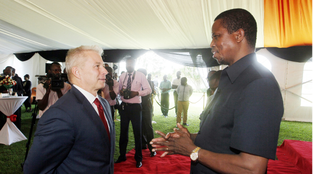 •PRESIDENT Lungu (right) talks to American Ambassador to Zambia Eric Shultz during the annual greeting ceremony for diplomats accredited to Zambia held at State House yesterday. Picture by SALIM HENRY/STATE HOUSE