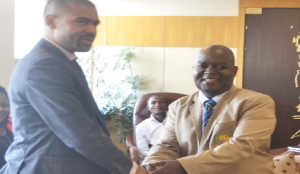•SPORTS Minister Vincent Mwale (left) congratulates former AUSC general secretary Sonstone Kashiba. Picture by GWEN CHIPASULA