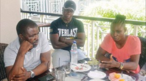 •WORLD Boxing Council bantamweight gold champion Catherine Phiri speaks during a briefing at Southern Sun Hotel yesterday as trainer Mike Zulu (centre) and manager Chris Malunga listen. Picture by ADRIAN MWANZA