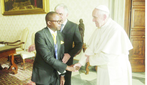 •THE author greets Pope Francis in the apostolic palace at the Vatican. Picture by SALIM HENRY/STATE HOUSE
