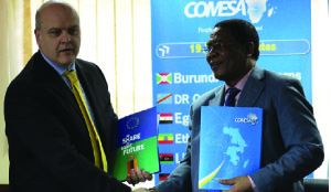 •Head of the European delegation to Zambia Ambassador Alessandro Mariani (left) exchange a copy of the agreement with the Common Market for Eastern and Southern Africa (COMESA) secretary general Sindiso Ngwenya. Picture  courtesy of European Union