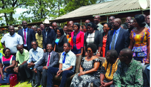• President Edgar Lungu (seated fourth right) and Michael Nguluta (seated fourth left) with others pose for a picture.