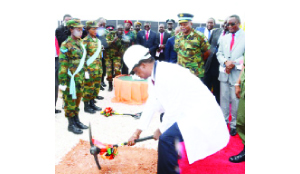 •President Edgar Lungu breaks the ground to officially launch the Zambia Air Force Twin Palm Public Private Partnership construction project. Picture by ROYD SIBAJENE/ZANIS