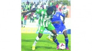 • ‘MIGHTY’ Mufulira Wanderers player Mike Katiba (left) battles for the ball with Nkwazi’s Kennedy Lungu during yesterday’s MTN-FAZ Super League Week 19 league match played at Nkoloma Stadium. Picture by GWEN CHIPASULA