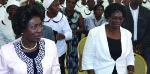 VICE-President Inonge Wina (left) joins congregants in singing during a prayer and thanksgiving service at the Presbyterian Church in Lusaka yesterday. Picture by CHILA NAMAIKO