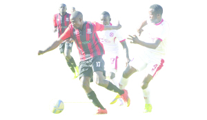 •SOCCER fans scamper for safety after police fired teargas to disperse fans who wanted to enter the stadium by force prior to yesterday’s MTN-FAZ Super League match between Zanaco and Nkana.