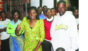 •FORUM for Democracy and Development Chienge Member of Parliament-elect, Given Katuta with her supporters. (Inset) Her husband Lawrence Mwelwa joins the celebrations. Pictures by Eugene Mukuyungwa/ZANIS