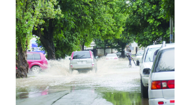 • SOME Lusaka roads have experienced floods after heavy rains pounded the capital from Monday night into yesterday morning. Above. Part of the flooded Longolongo road. Picture By JEAN MANDELA.