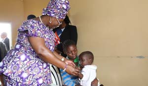 • FIRST Lady Esther Lungu admires a baby during a tour and handover of food hampers to beneficiaries at Misissi Health Outreach Center at St.Lawrence Parish in Kamwala South, Lusaka. Picture by KACHA MIYOBA/ZANIS