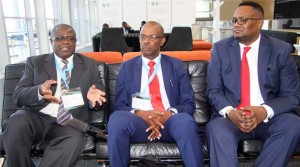 MINES Minister Christopher Yaluma stresses a point as deputy Secretary to the Cabinet Christopher Mvunga (centre) and Zambia’s High Commissioner to South Africa, Emmanuel Mwamba listen during an interview with journalists on the sidelines of the on-going mining Indaba at Cape Town Convention Centre in South Africa yesterday. Picture by CHILA NAMAIKO