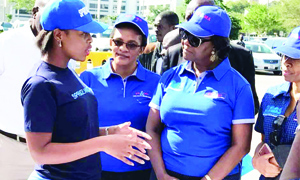 • COMMERCE Trade and Industry Minister Margaret Mwanakatwe (right) listens to Spruceland Technologies Group Head of Sales and Marketing Mubanga Kapambwe (left) as Zambia Weights and Measures Agency Acting Director Adrine Muchimba looks on at the recent commemoration of the World Metrology Day.
