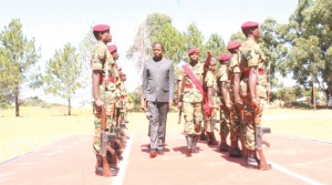 • PRESIDENT Edgar Lungu inspects a guard of honor on arrival at KARA Barracks in Kawambwa where Government is constructing 995 housing units for the 48 Marine Commandos. Picture by ALEX MUKUKA/ZANIS 