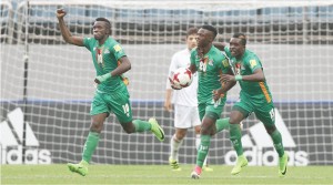  FASHION Sakala #10 celebrates his opening goal with teammates Patson Daka #20 and Shemmy Mayembe #13 during yesterday's FIFA World Cup match against Iran at Jeju World Cup Stadium in South Korea. Picture courtesy of FIFA via GETTY IMAGES