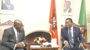  PRESIDENT Edgar Lungu (right) and his Ghanaian counterpart Nana Akufo-Addo share a light moment before holding private talks at State House in Lusaka yesterday. Picture By SALIM HENRY/STATE HOUSE