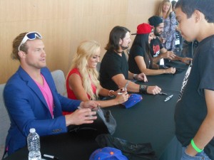 WWE superstar Dolph Ziggler and his fellow stars sign autographs during the Make-A-Wish family event at one world observatory centre. by picture by elias chipepo 